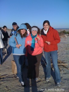 young-professionals-beach-retreat-0011 Becca, Jenny & Lisa doing the smore thing!  Did you know you can stick the chocolate in the middle of the marshmallow and it will melt the chocolate?  Thanks for the tip Lisa!