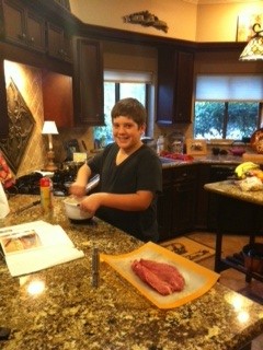 Seth mixing the glaze for the Citrus Glazed Pork Tenderloin.