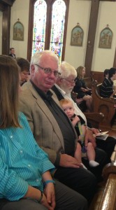 Having a baby to hold is always peaceful. ;)  Riley sitting with his Papa (my dad).  My Uncle Frank next to my father can be seen too.  