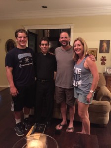 Seth, Fr. Richard, Neal and I at our 'renewal ceremony'... yes Seth has a headband on! He just came back from playing Dodgeball at youth group! ;)